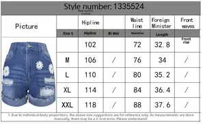 Size chart table for women's denim shorts featuring daisy embroidery and frayed hem details