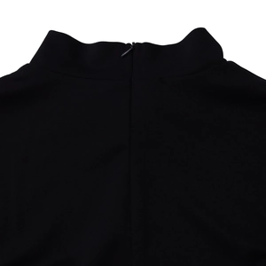 Detail of elegant black half-high collar dress featuring a sleek back invisible zipper