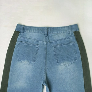 Patchwork wide-leg denim jeans for women featuring blue denim and green side panels