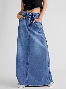 Detail of high waist denim skirt featuring vertical stitching and functional side pockets