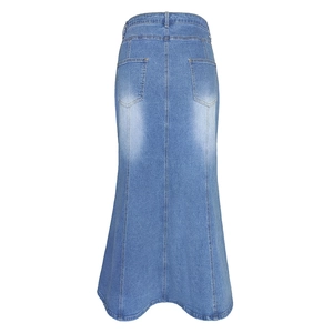 Detail view of light blue denim fishtail skirt featuring back pockets and washed finish
