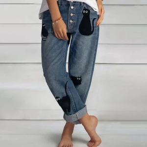 Jean droit bleu à taille haute avec écussons de chat vintage et patte de boutonnage