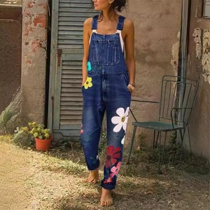 Deep blue denim overalls with floral patterns and adjustable straps in casual style