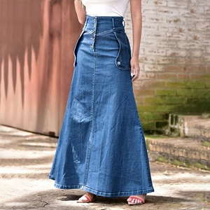 Macro shot of high waist denim skirt with metal buttons and large cargo pockets