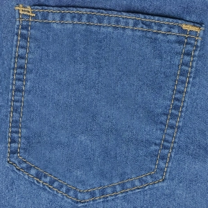 Detailed close-up of blue cotton denim back pocket with yellow double-needle stitching