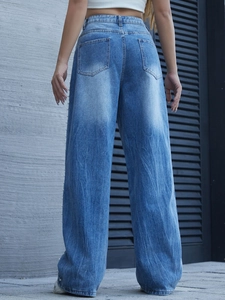 Jeans dritti da donna lavaggio vintage blu con perle bianche laterali e stile retrò