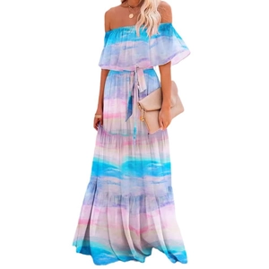 Detail of bohemian off-shoulder maxi dress with blue-pink watercolor gradient and tiered skirt