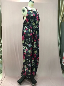 Detail view of tropical floral print fabric on sleeveless wide leg summer jumpsuit