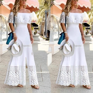 Elegant white off-shoulder lace maxi dress with bohemian crochet details for vacations