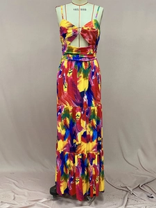 Detail of colorful abstract print and front cutout on a summer sleeveless long dress