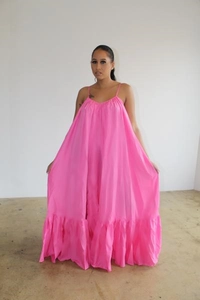 Detailed front view of bright pink sleeveless maxi dress with ruffle hem and V-neck line