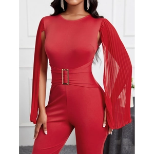 Elegant red long sleeve jumpsuit with gold buckle belt and sheer chiffon cape sleeves