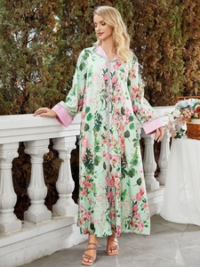 Elegant light green floral kaftan maxi dress with long sleeves and V-neckline style