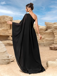Elegant black one-shoulder maxi dress with cape sleeve for a vintage look