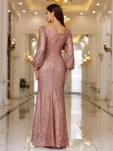 Elegant rose gold sequin evening gown with puffed sleeves and flattering slim fit