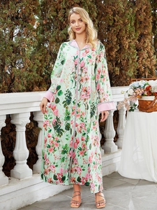 Elegant mint green floral kaftan maxi dress with long sleeves and pink contrast trim details