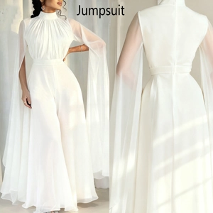 Detailed front and back view of white chiffon cape sleeve jumpsuit with pleated chest