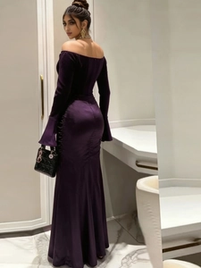 Elegant deep purple velvet and satin off-shoulder evening dress with a split back hem