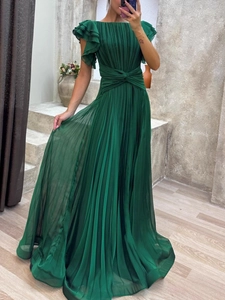 Elegant dark green pleated maxi dress with ruffle sleeves and cinched waist for formal events