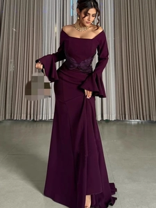 Deep purple off-the-shoulder gown with bell sleeves, bow detail and elegant fishtail hem