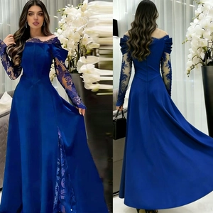 Detail of royal blue evening gown with lace embroidery sleeves and elegant back zipper