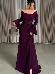 Elegant plum off-shoulder long-sleeve evening gown with ruched waist and flare sleeves
