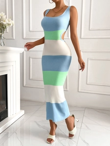 Detail of color-block striped knit dress with waist cutout and side tie design
