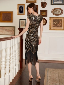 Elegant vintage sequin fringe evening gown with gold geometric patterns and tassels