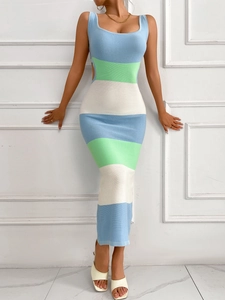 Close-up of the knitted texture and side cutout detail of this striped beach dress