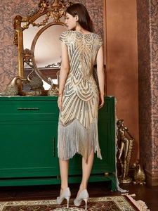 Elegant vintage sequin tassel gown with mermaid fringe for formal evening events