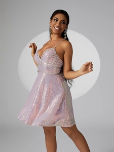 Detailed view of pink sequin party dress with silver embroidery and delicate straps