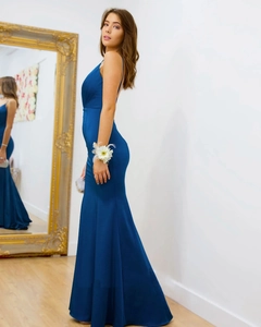Detail of navy blue slim fit mermaid dress with thin straps and open back design