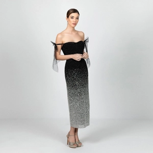 Sparkly black and silver gradient sequin off-shoulder evening dress with tulle bows