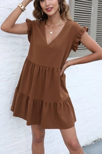 Detail of V-neck brown tiered mini dress with ruffle sleeves in casual summer style