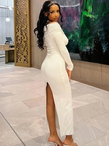 Elegant white off-shoulder bodycon dress with long sleeves and stylish back slit detail