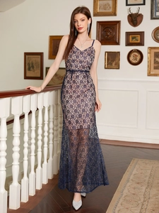 Elegant slim fit navy blue lace maxi dress with spaghetti straps and sheer floral details