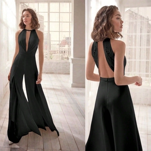 Elegant black deep V-neck halter jumpsuit with wide legs and back embroidery detail