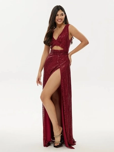 Detail of burgundy sequin evening gown featuring a deep V-neck and high leg slit