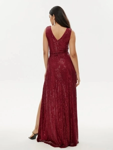 Detail of burgundy sequin evening dress showing deep V-back and shimmering slim-fit fabric