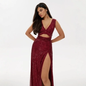 Elegant burgundy sequin halter neck dress with deep V-neck and high side slit