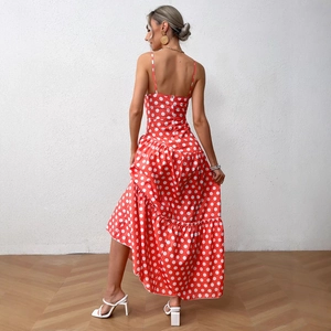 Elegant red polka dot sleeveless maxi dress with spaghetti straps and ruffled hemline