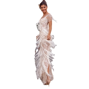 Elegant sleeveless white long dress with fringe tassels and delicate embroidery details