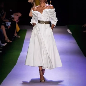 Elegant white off-shoulder long sleeve maxi dress with wide brown belt for runway gala