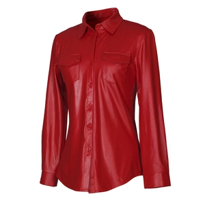 Close-up of red PU leather shirt featuring glossy finish, pointed collar and chest pockets
