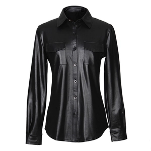 Detailed close-up of a black faux leather long sleeve shirt with metallic glossy finish