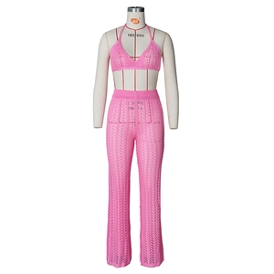 Close-up of pink crochet knit texture and wave patterns on the summer two-piece set