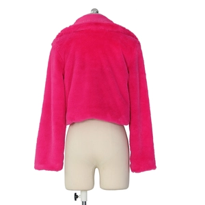 Rear view of vibrant pink short faux fur jacket with plush texture and long sleeves