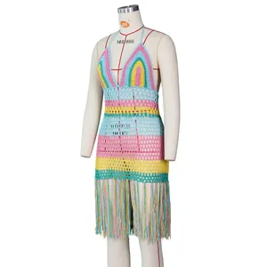 Macro detail of multi-color crochet hollow knit and fringe tassel on beach cover-up dress