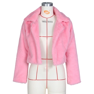 Detailed close-up of bright pink cropped faux fur jacket with large wide collar