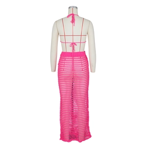 Detailed back view of a rose pink crochet hollow knit two-piece beach cover-up set